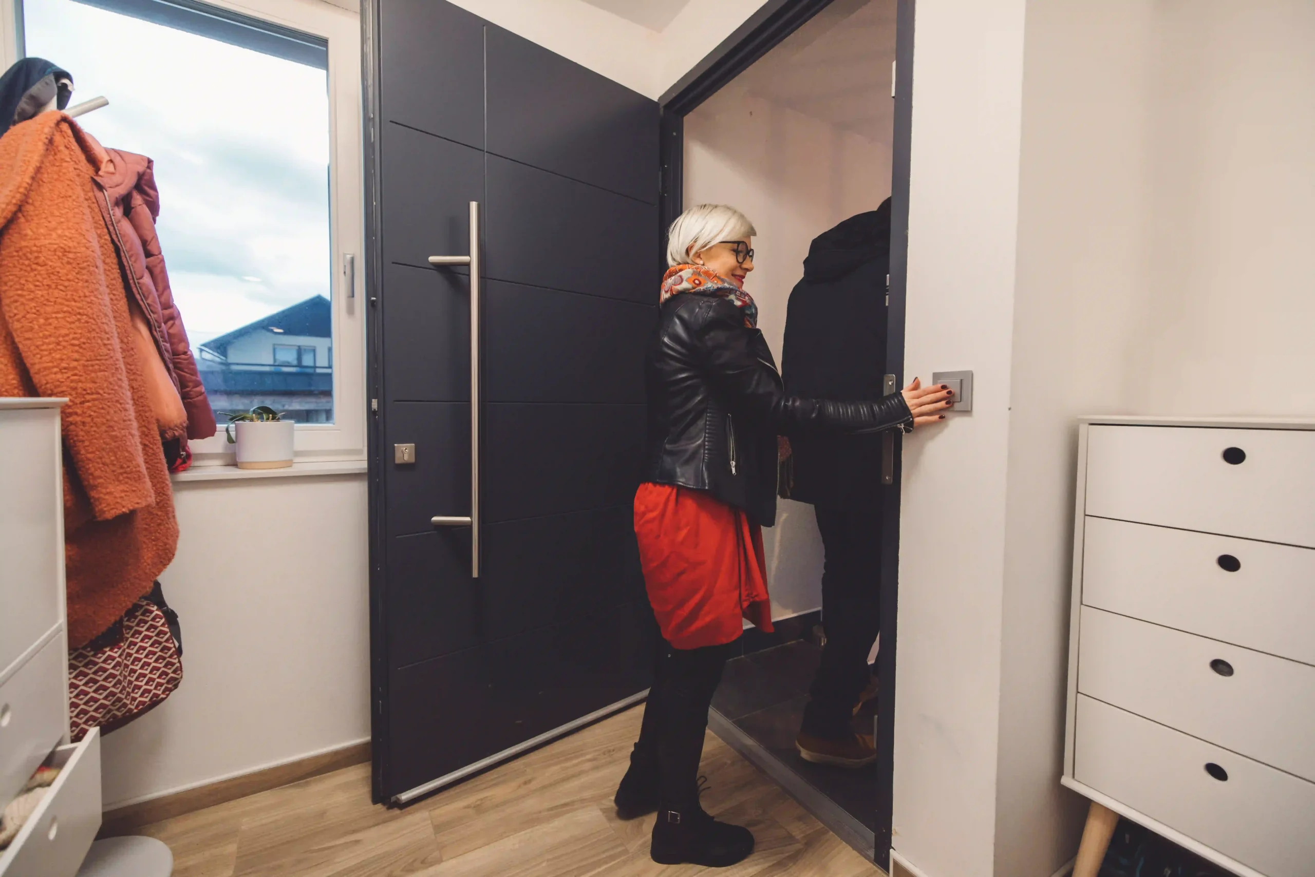 family-ascending-a-staircase-in-their-new-modern-h-2025-01-29-04-33-05-utc