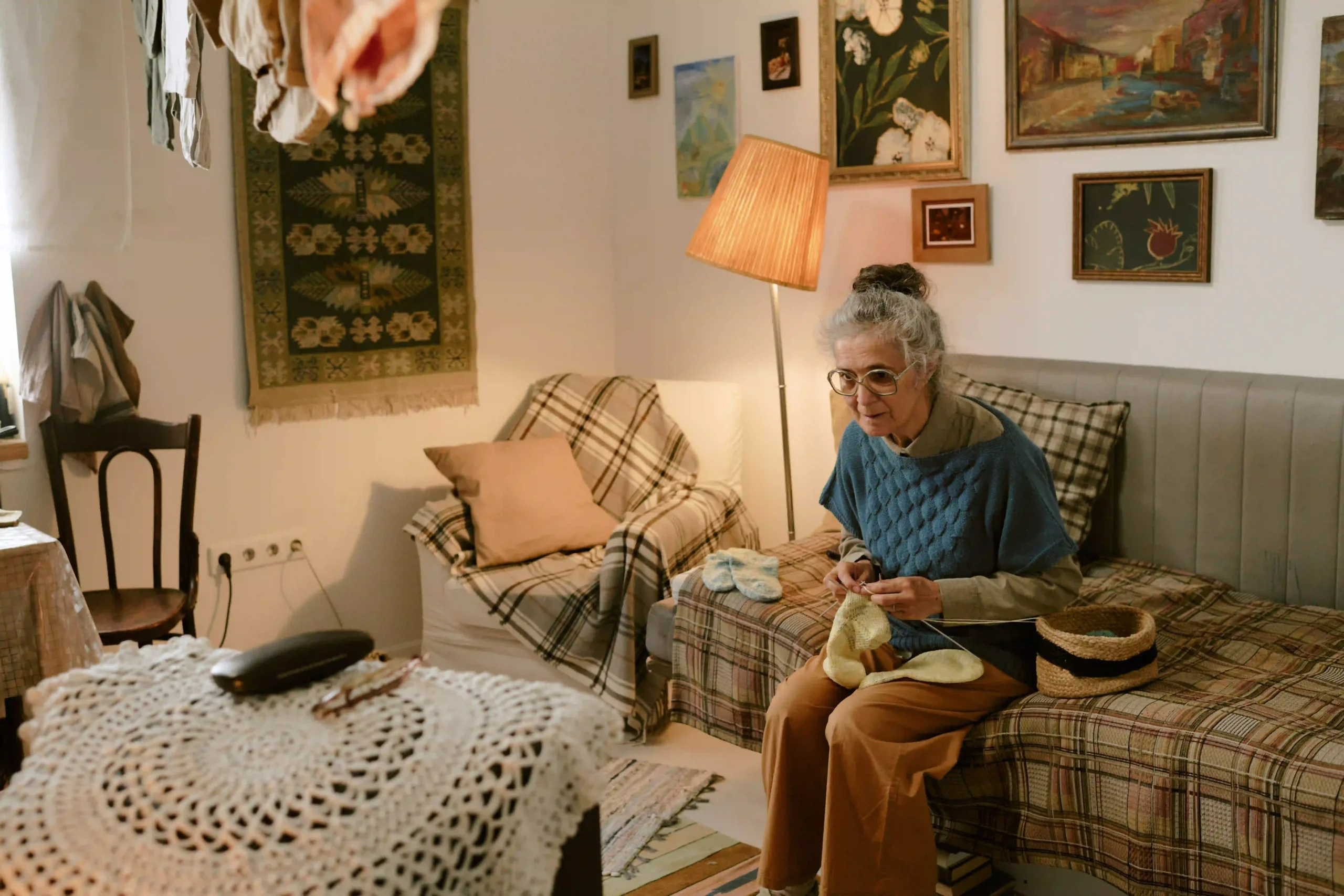 senior-caucasian-woman-sitting-indoors-knitting-ya-2025-07-08-21-45-01-utc